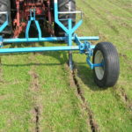 Double-Plow Installing 12-inch Tape Product