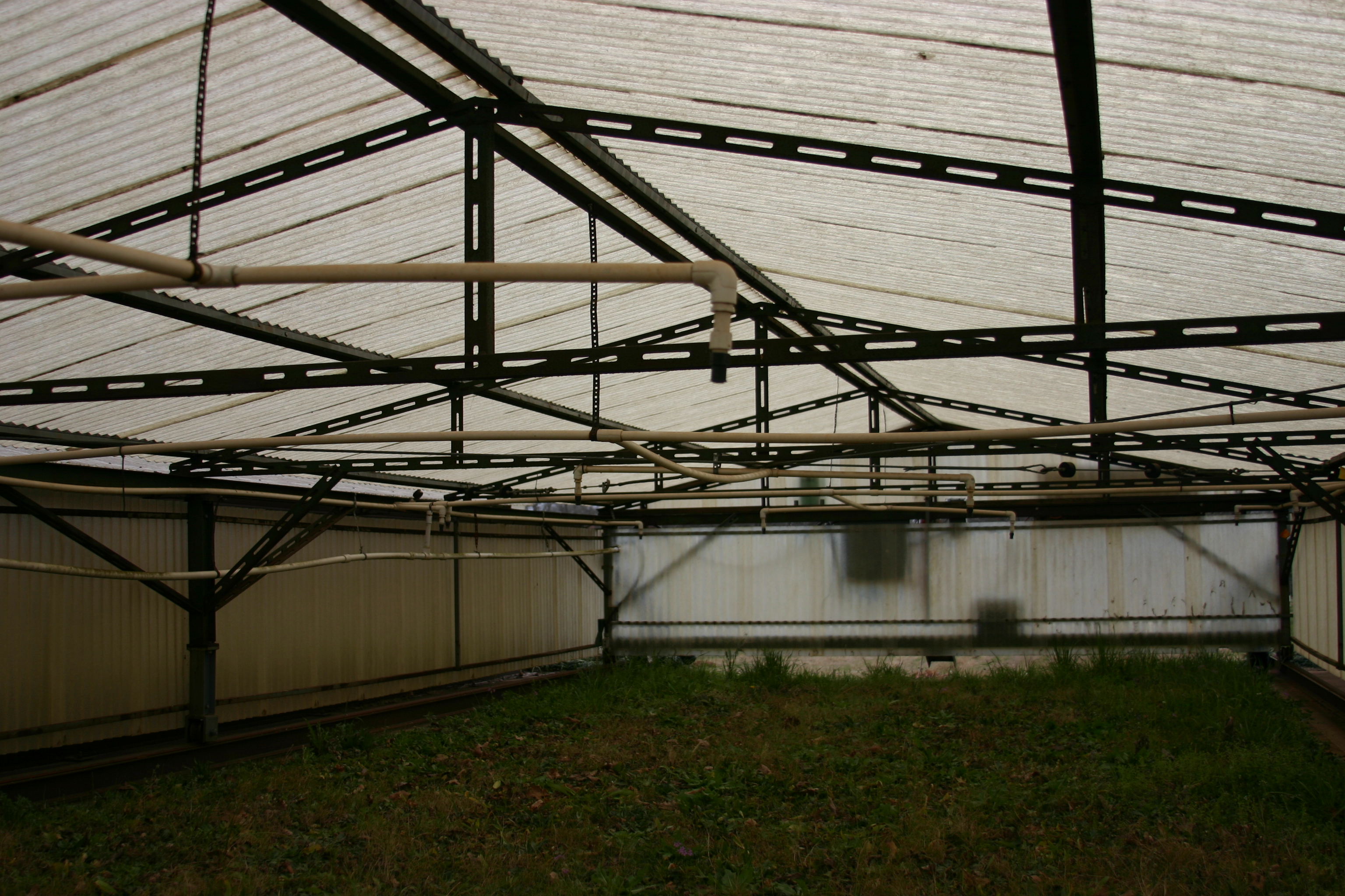 Images showcasing the structure and design of the small rainout shelter created by University of Georgia.