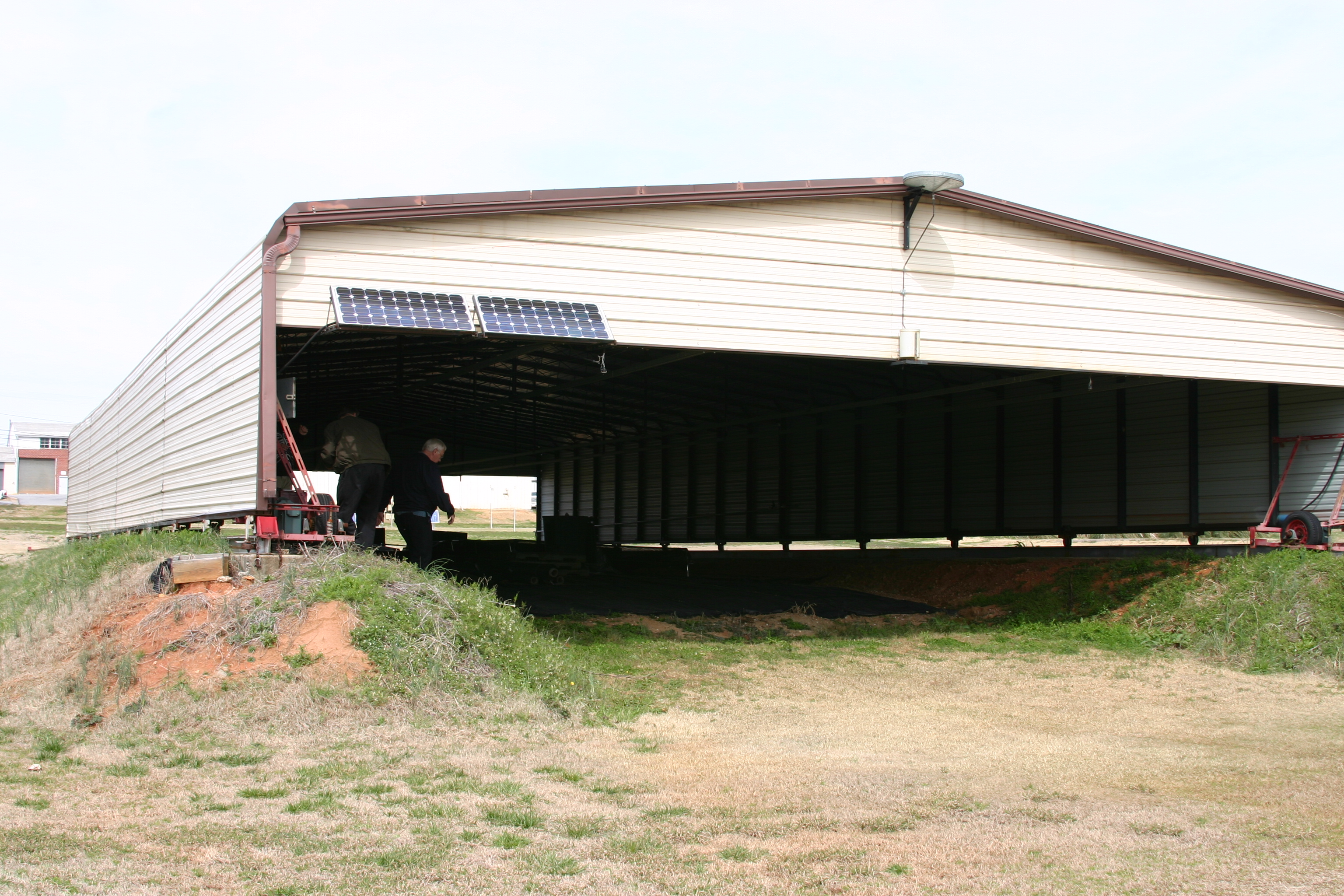 Images showcasing the structure and design of the large rainout shelter created by University of Georgia.
