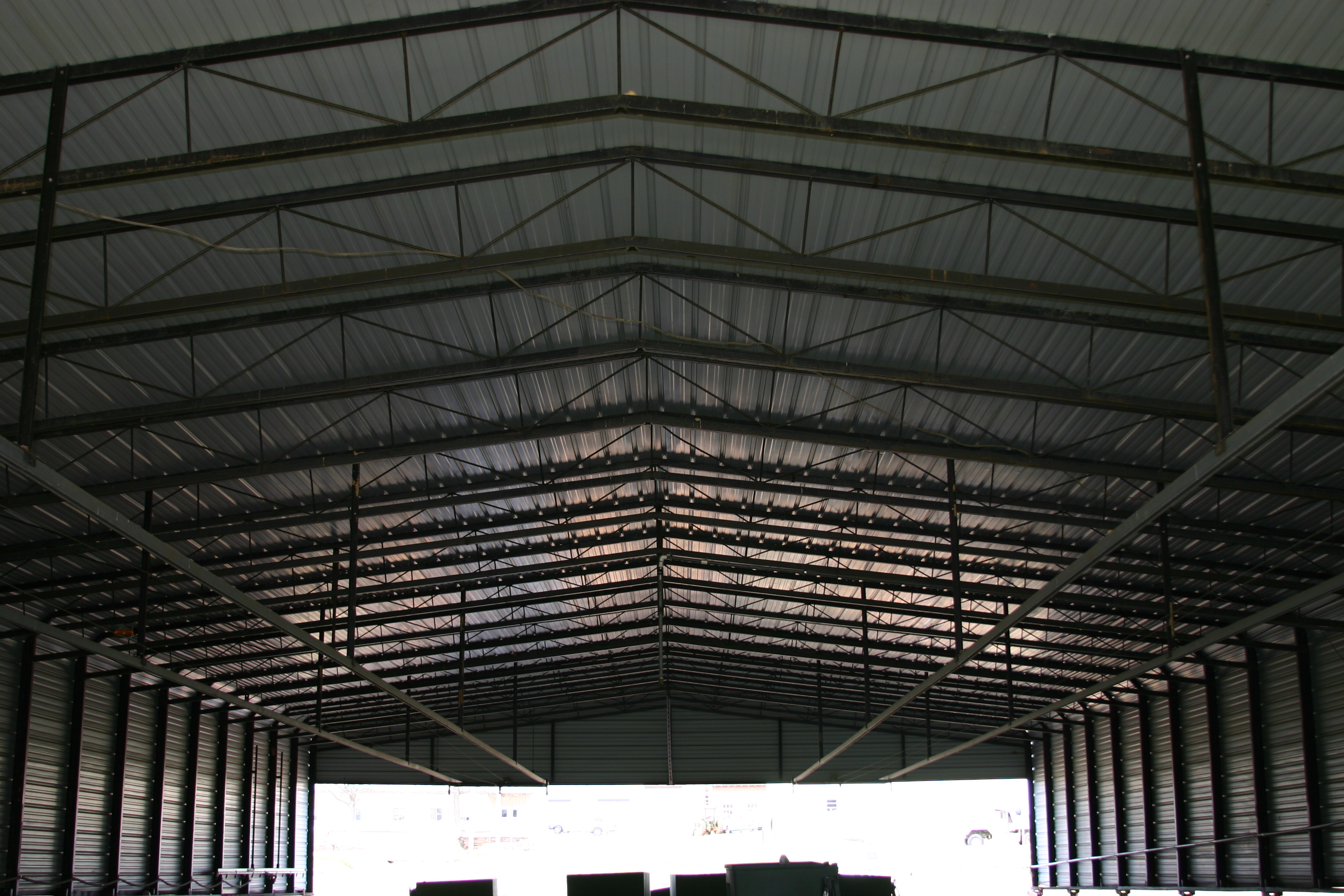 Images showcasing the structure and design of the large rainout shelter created by University of Georgia.