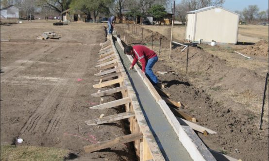 Images of the creation of the concrete beam needed for the drought simulator.