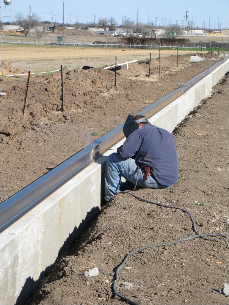 This slideshow contains images showing various steps in the process of creating the metal beams necessary for the drought simulator.